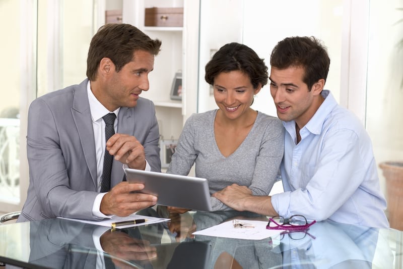 Three people having a meeting